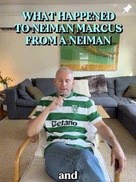 Alex sitting on his sofa in his pinned reel about Neiman Marcus